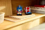 Optimus Prime models on a desk.