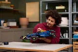 Person holding RB20 F1 model.