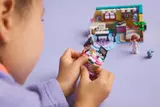 Child playing with Liann.