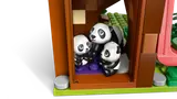 Pandas inside LEGO treehouse.