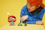 Child observing open Toad's house.