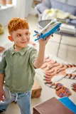 Child holding jet