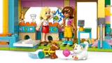 Interior view of the pet shop with minifigures and playing pets.