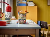 Spider-Man's Apartment on desk.