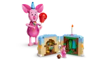 Open cake with interior scenes and Piglet.