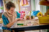 Child playing with Piglet and cake set.