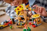 Child playing with LEGO drone.