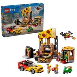 Set box and full LEGO pizza delivery set.