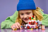 Child playing with set.