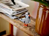 LEGO Creator pigeon on display.