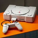 LEGO PlayStation on orange.
