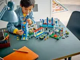 Child playing with set.