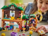 Child playing with ranch interior.