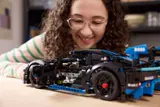 Inspect the Porsche GT4 mechanics.