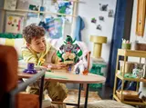 Child playing with Bowser's Castle set.