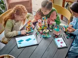 Building the castle with digital instructions.