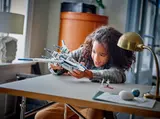 Child playing with U-Wing.