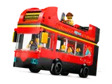 Dynamic red double-decker bus in motion.