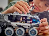 Child interacting with Juggernaut interior.