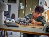 Child playing with Juggernaut set.