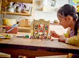 Child playing with LEGO Friends restaurant.