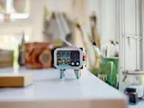 LEGO Retro TV on desk.