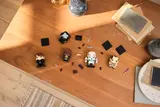 Overhead view of disassembled BrickHeadz.