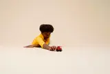 Child focuses on play.