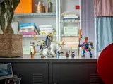 Full set displayed on a cabinet.