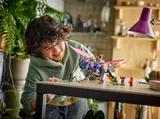 Child playing with Dragon Rontu.
