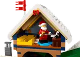 Santa in the attic with a bell.