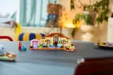 Finished LEGO Bluey house on table.