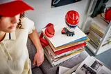 Helmet displayed on books.