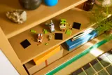 Shrek BrickHeadz parts on shelf.