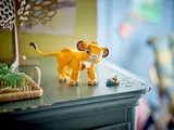 Simba cub displayed on a cabinet.