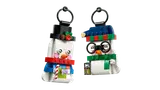 Angled view of two LEGO snowman ornaments.