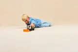 Child pushing Snowplow.