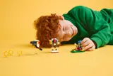 Child playing with LEGO Sonic.