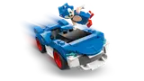 Sonic jumping over his car with motion blur.