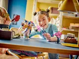 Child playing with Sora's Tech Mech.