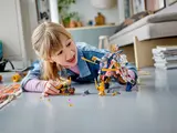 Child playing with Mech Bike
