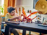 Kid playing with dragon
