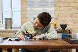 Child playing with LEGO set
