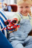 Child holding Spidey's Hydro-Spider.
