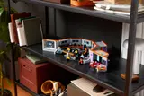 Enterprise bridge on bookshelf.
