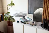 Enterprise D on white cabinet.