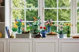 LEGO Botanical Collection on a windowsill.
