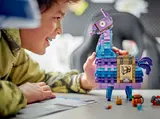 Boy admiring LEGO Llama.