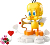 Cupid Tweety on cloud with bow and flowers.