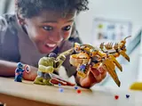 Child playing with LEGO Avengers.